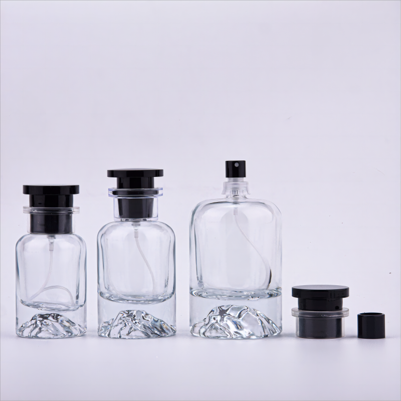 Contemporary Elegance: Crystal-Clear Glass Perfume Bottles with Black Accents