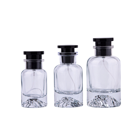 Contemporary Elegance: Crystal-Clear Glass Perfume Bottles with Black Accents